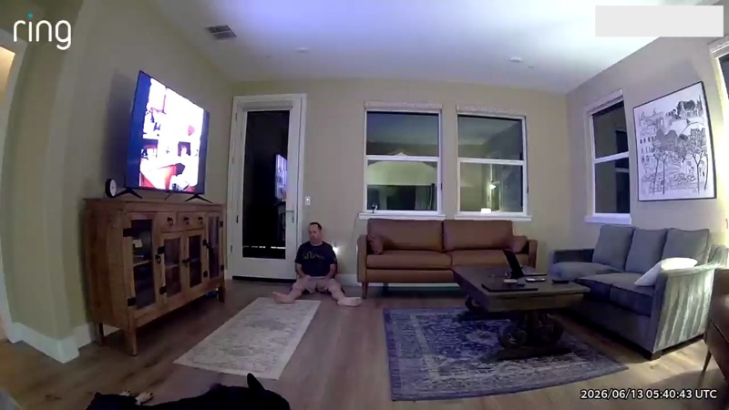 Early test: sitting on the living-room floor against the wall at night