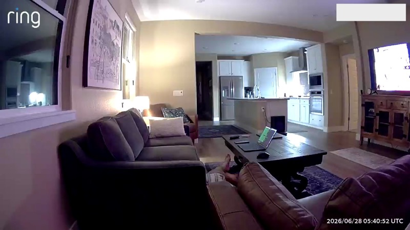 Early test: only feet visible at the end of the couch